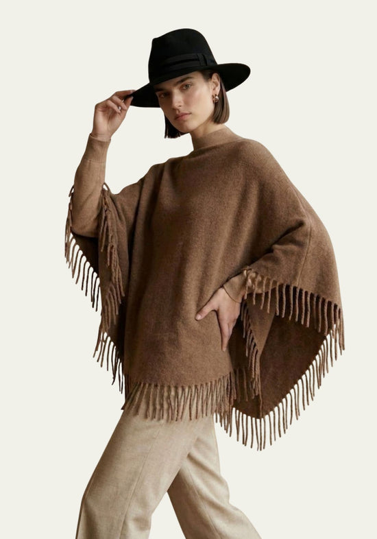 Women’s fringed poncho in a warm camel shade, one size