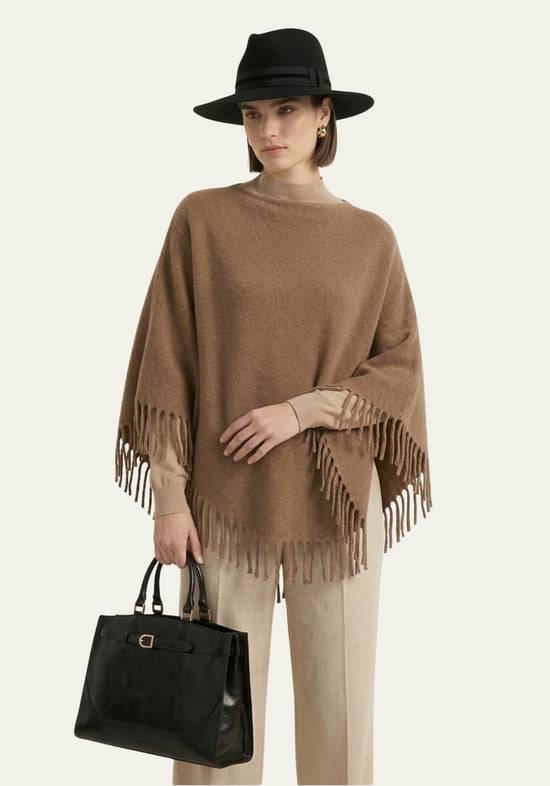 Women’s fringed poncho in a warm camel shade, one size
