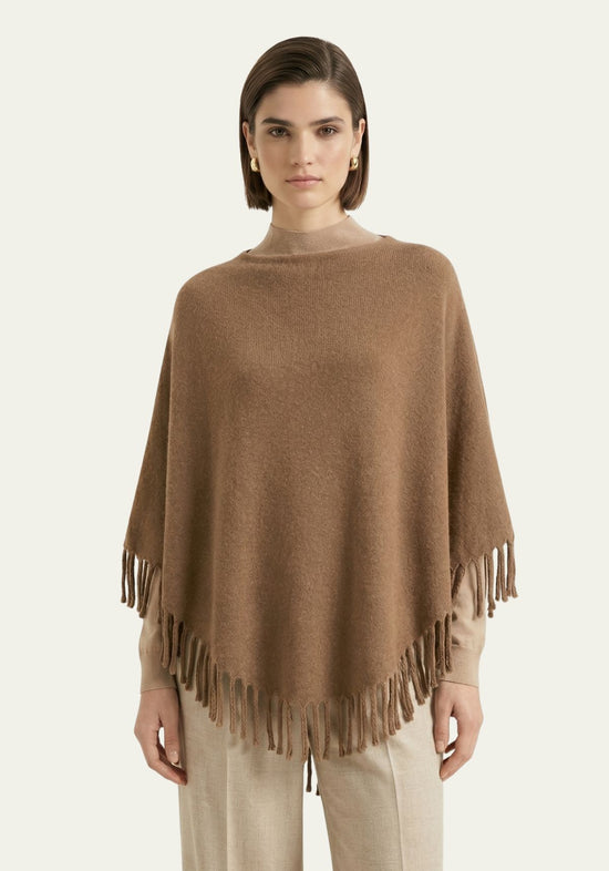 Women’s fringed poncho in a warm camel shade, one size