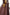 Detail of the gold-coloured lock and stitching on the bordeaux leather doctor’s bag.