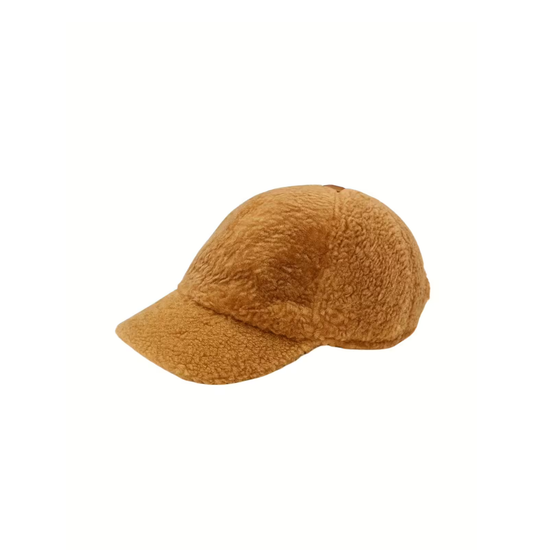 Brown sheepskin cap isolated on a white background, shown in side view with a brim.