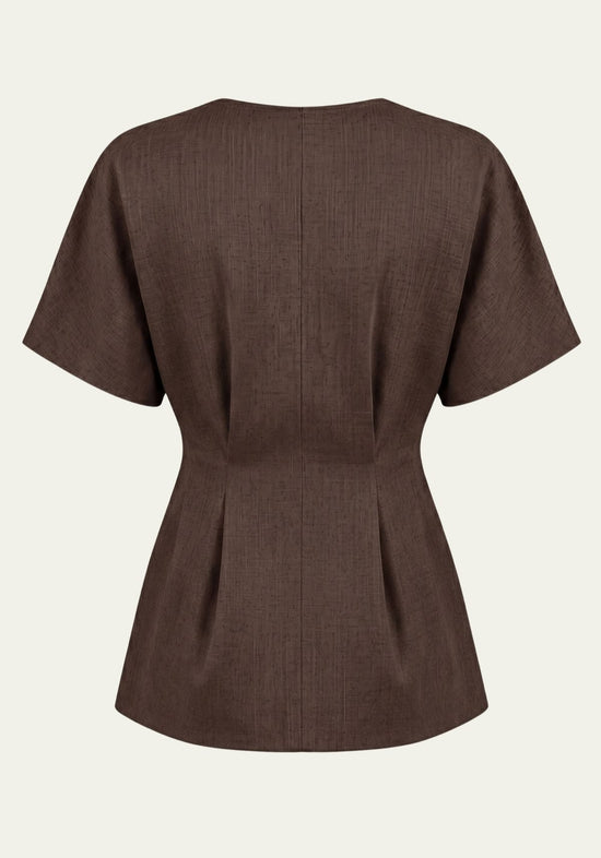 Back view of a brown women’s blazer in linen with a fitted shape and short sleeves.