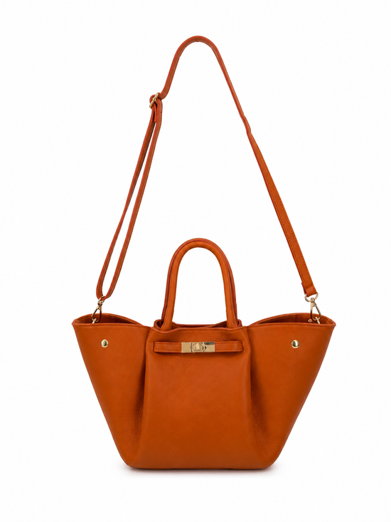 Women's leather handbag in cognac from the back, with a long detachable shoulder strap.