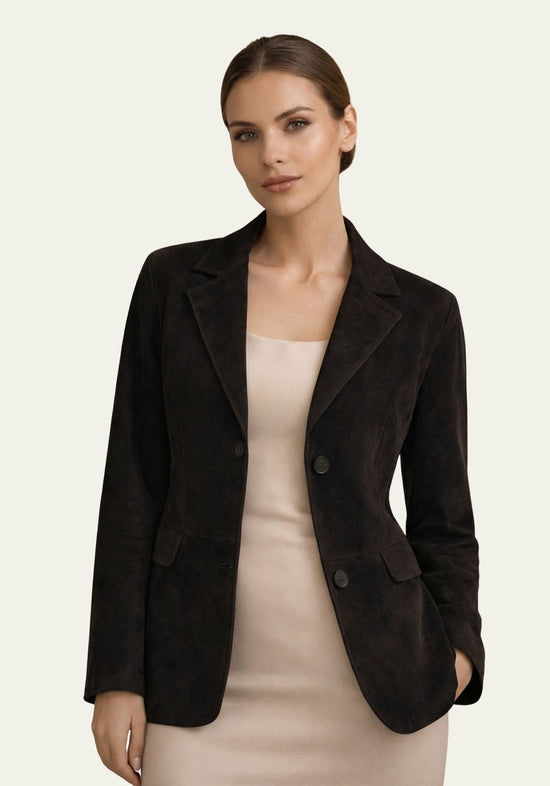 Women's jacket in black suede shown in a half-length view, open at the front with flap pockets.