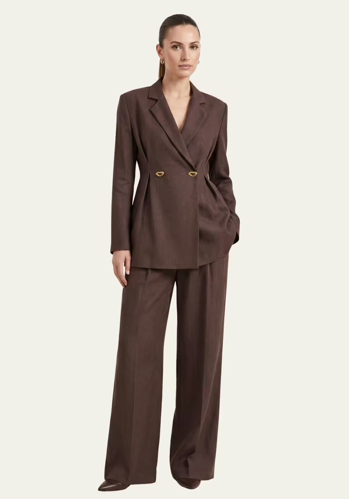 Women's linen blazer with palazzo trousers in brown, shown worn from the front.