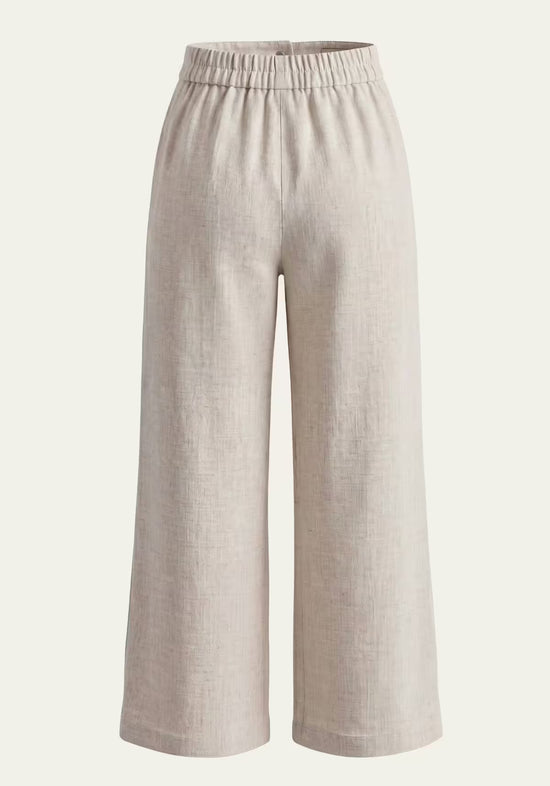 Beige women's palazzo trousers in linen with an elastic waistband and wide legs.