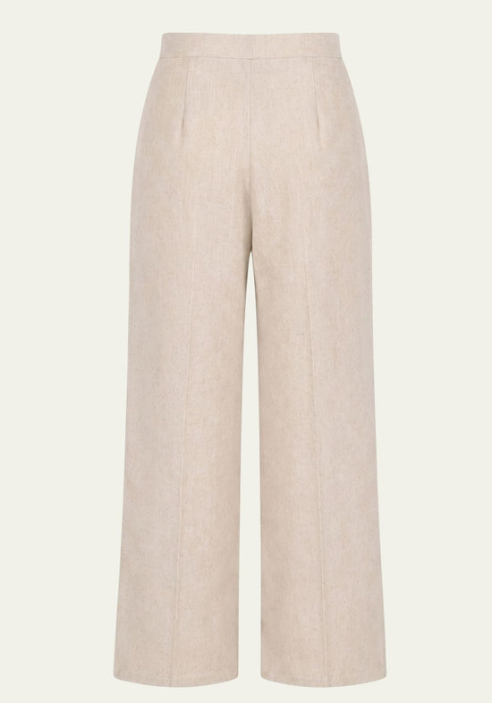 Beige women's palazzo trousers made of linen shown from the back with wide legs and a smooth waistband.