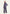 Back view of the women’s blue linen two-piece set with blazer and wide palazzo trousers.