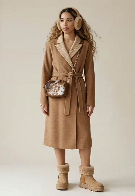 Women's wool and alpaca coat in brown, shown as a complete look with bag, earmuffs and boots.