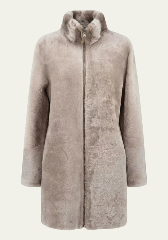 Beige sheepskin women's coat with soft wool side, front view without model