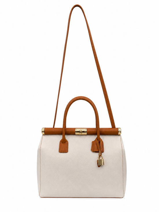 Ladies' leather handbag in beige with a long shoulder strap, shown isolated