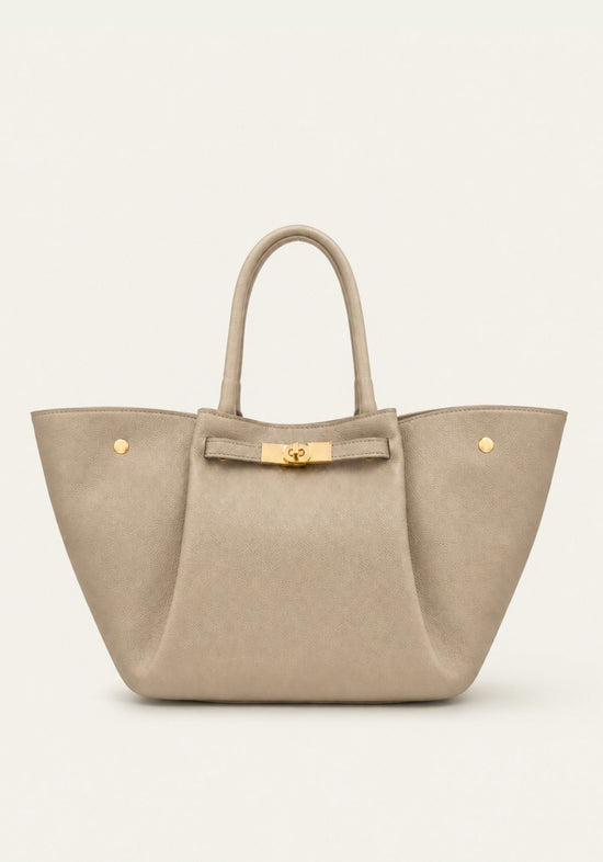 Women's leather handbag in cream beige, front view with handles and gold-coloured clasp.