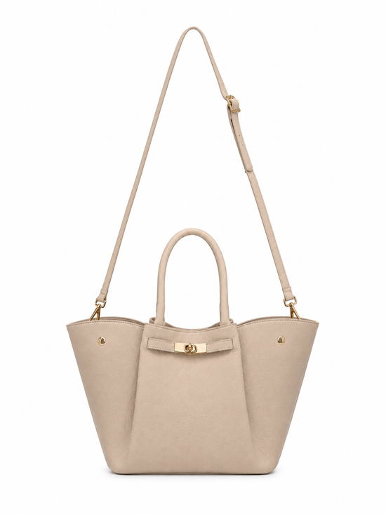 Women's leather handbag in cream beige, front view with a long shoulder strap for crossbody wear.