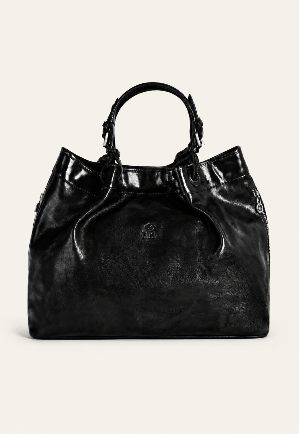 Black leather handbag with short handles shown from the front on a light background.