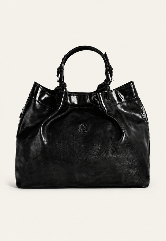 Black leather handbag with short handles shown from the front on a light background.