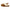 A brown women's sheepskin slipper in side view with visible heel strap and shearling trim.