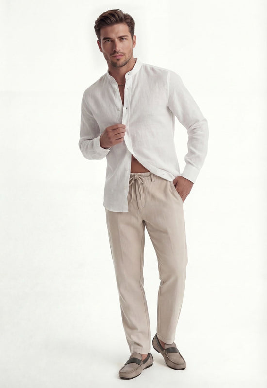 White men's linen shirt worn on a male model, with an open stand-up collar and relaxed fit.