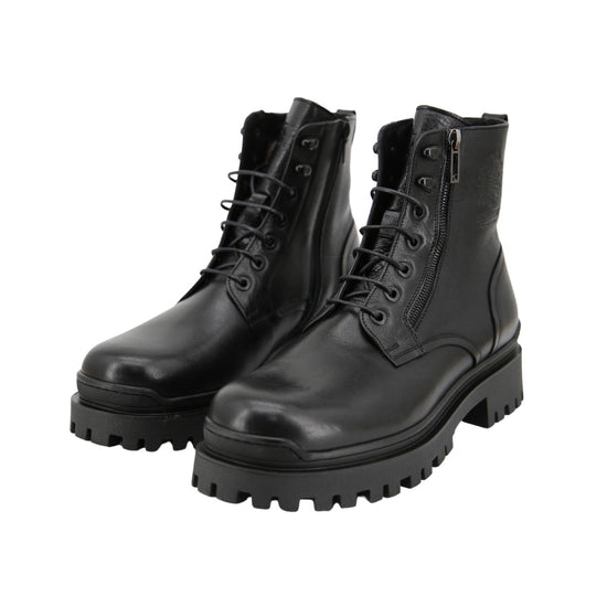 Pair of black men's sheepskin street shoes in front view with lacing and a lug sole