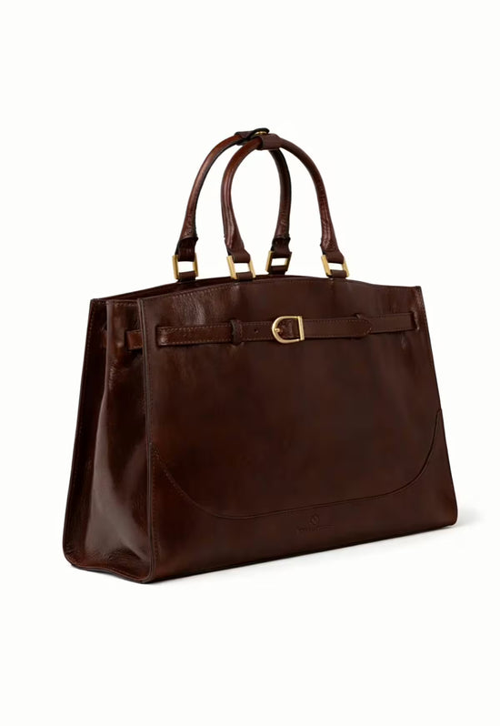 Brown leather hobo bag in an angled side view with handles, front strap and gold-coloured details.