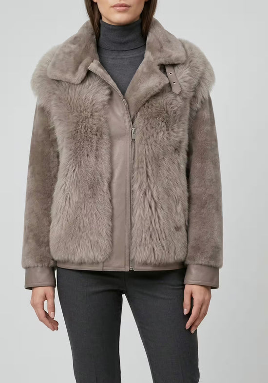 Women's sheepskin jacket in taupe, front view on a model with a high roll neck