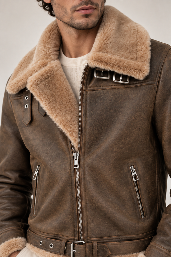 Close-up of the men's sheepskin jacket made from merino sheepskin with zip, collar and shoulder detail.