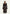 Brown sheepskin coat for women worn by a model from the front, with wide fur collar and turned cuffs.