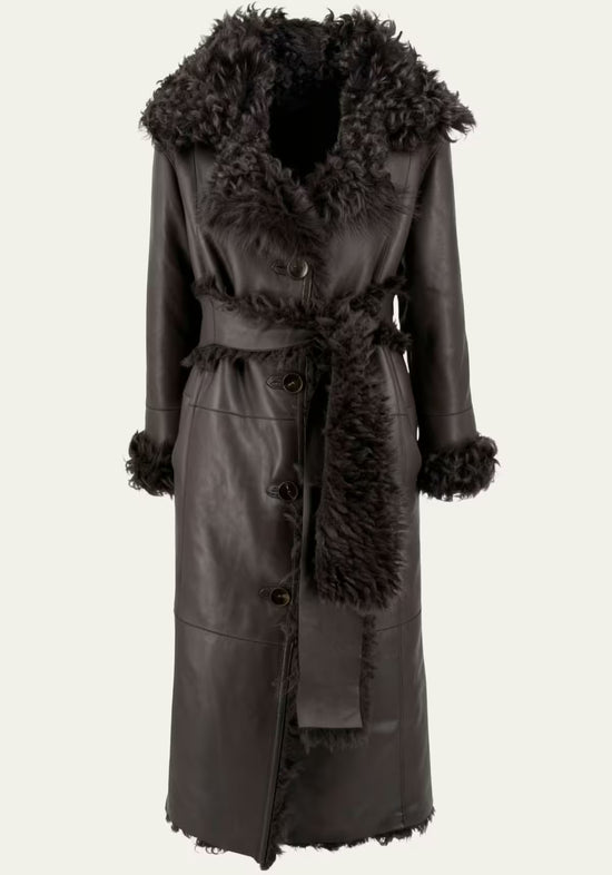 Women's sheepskin coat in dark brown with a wide collar and tie belt, shown from the front cut out.