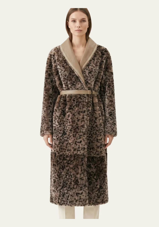 Women's sheepskin coat with leopard print in taupe and sand, worn on model from the front