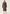 Women’s sheepskin coat in taupe on a model from the front, falling smoothly with a wide shawl collar.
