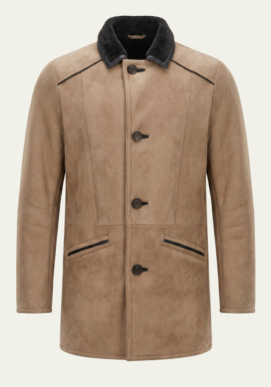 Men's sheepskin coat in camel with a black collar, button front and pockets in front view.
