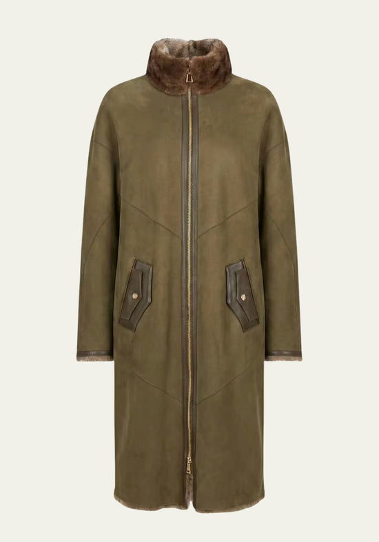 Sheepskin ladies' coat in olive with stand-up collar, zip fastening and pockets, front view.