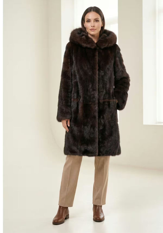 Brown Toscana sheepskin coat for women worn by a model in full-length view.