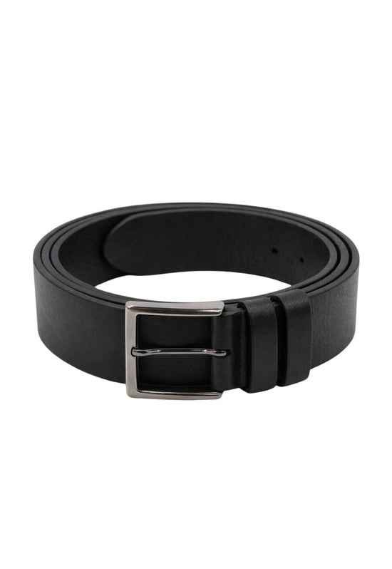 Black leather belt made from buffalo leather with a silver buckle, rolled and isolated