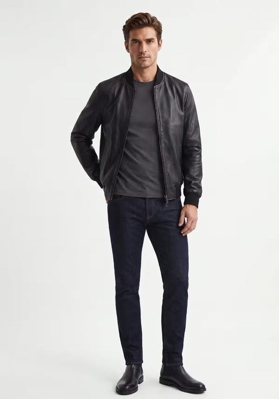 Men's leather jacket in black lamb nappa leather in a full view on model, front with pockets and stand collar.
