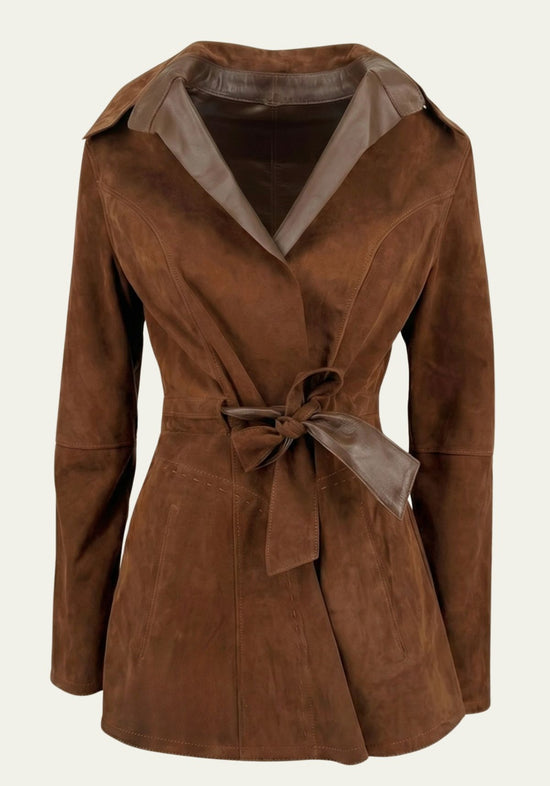 Brown women's leather jacket in suede, shown front-facing and cut out with tie belt and wide lapels.