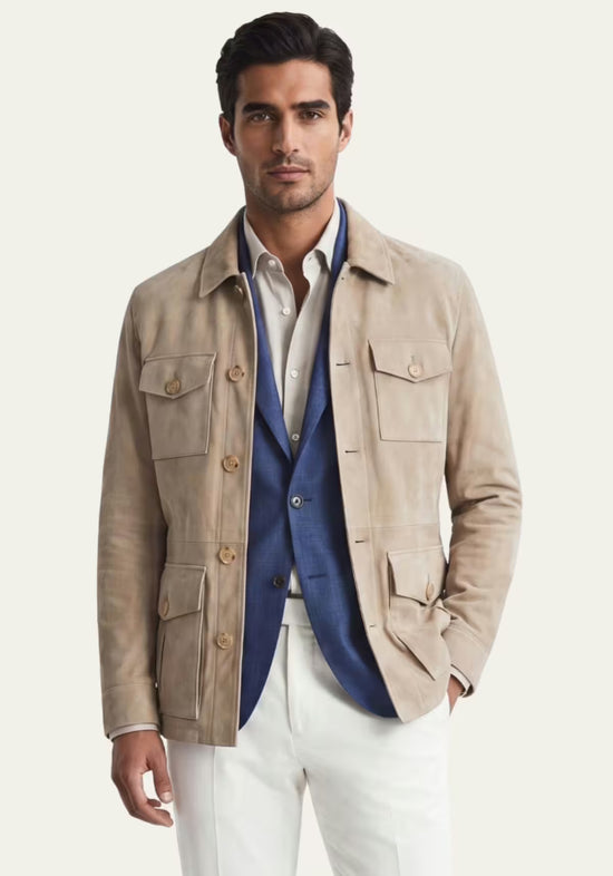 Beige men's leather jacket in suede shown worn with a blue blazer