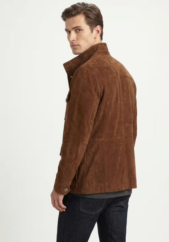 Men's suede leather jacket in cognac, worn from the side and back with a high collar.