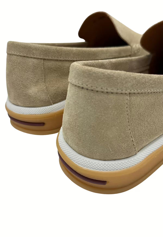 Men's loafers made of leather in beige, viewed from the back with sole and heel.