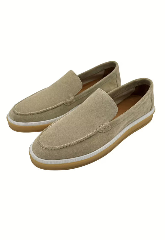Beige men's loafers made of leather shown as a pair in an angled view.