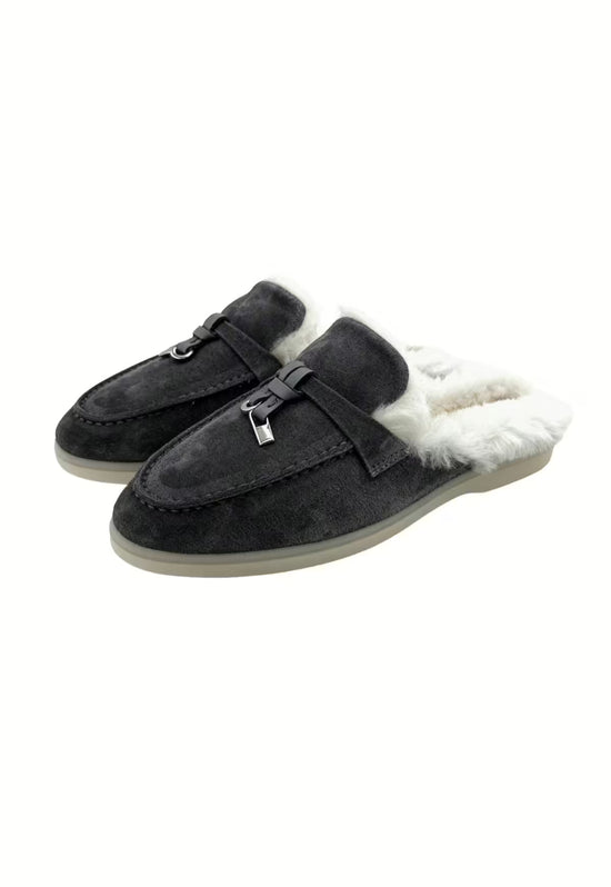 Women's sheepskin mules in anthracite shown as a pair, angled from the front with fur trim.