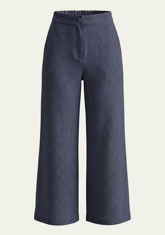 Women’s linen palazzo trousers in blue, shown from the front with a high waist and wide legs.