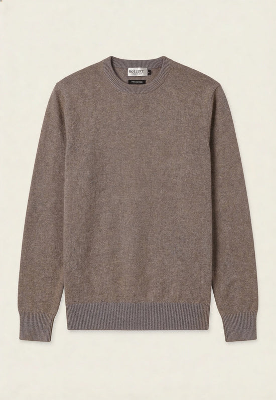 Unisex cashmere jumper in taupe, shown front-on cut out with ribbed cuffs.