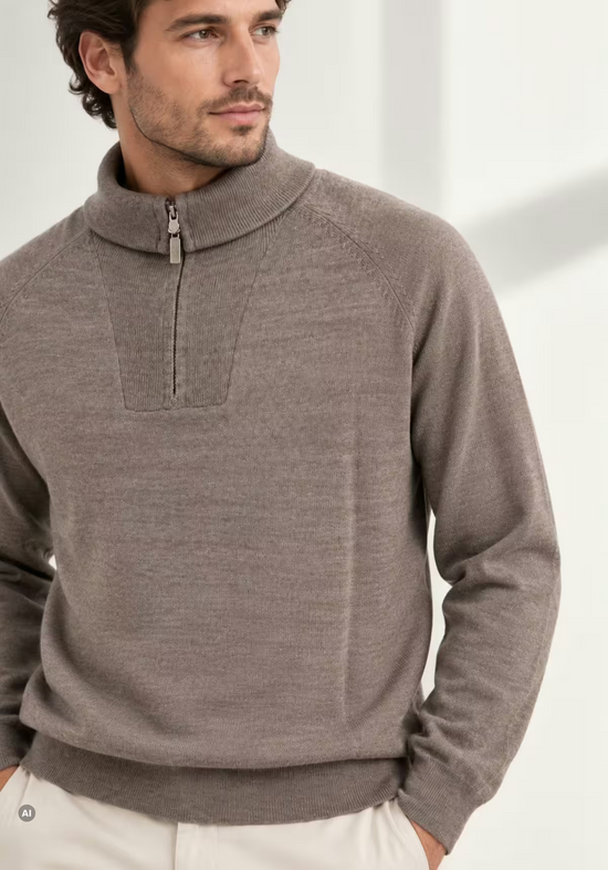 Men's merino wool pullover in taupe, worn on a model in an angled front view with a relaxed fit.