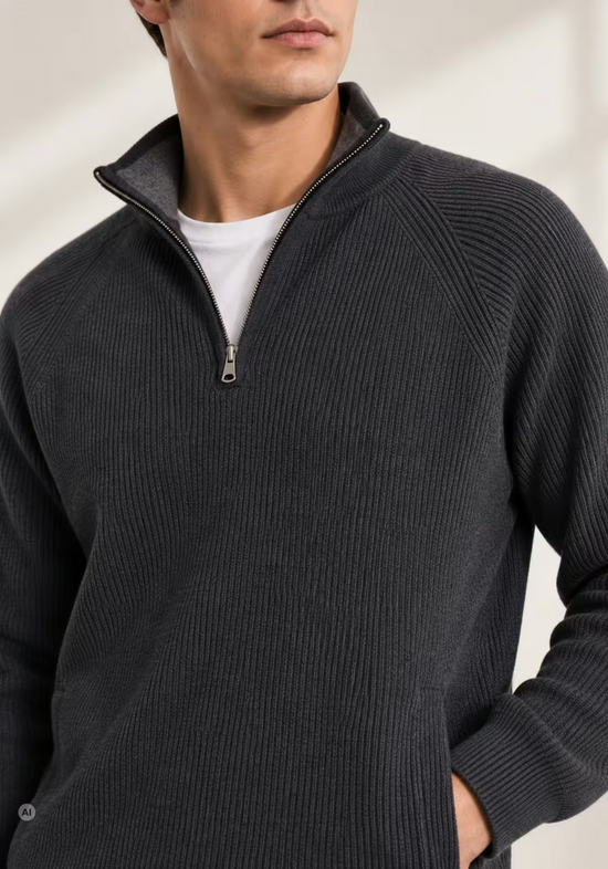Close-up of the anthracite men's merino wool pullover with ribbed texture and open stand collar.
