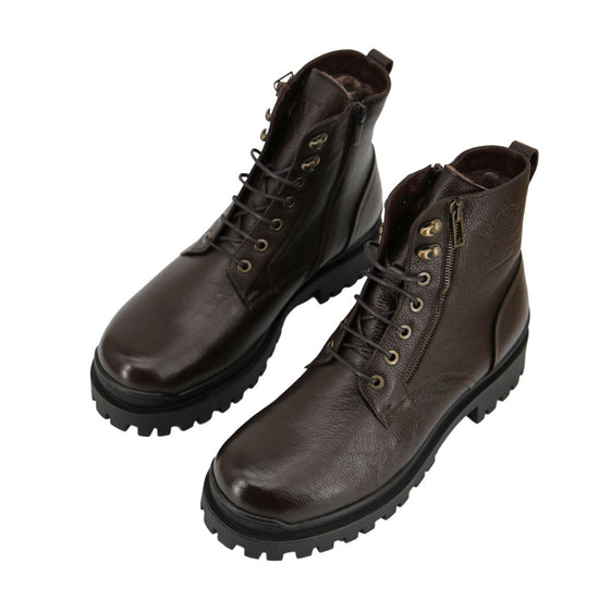 Pair of brown sheepskin men's street shoes in an angled view with smooth upper leather and a chunky tread sole.