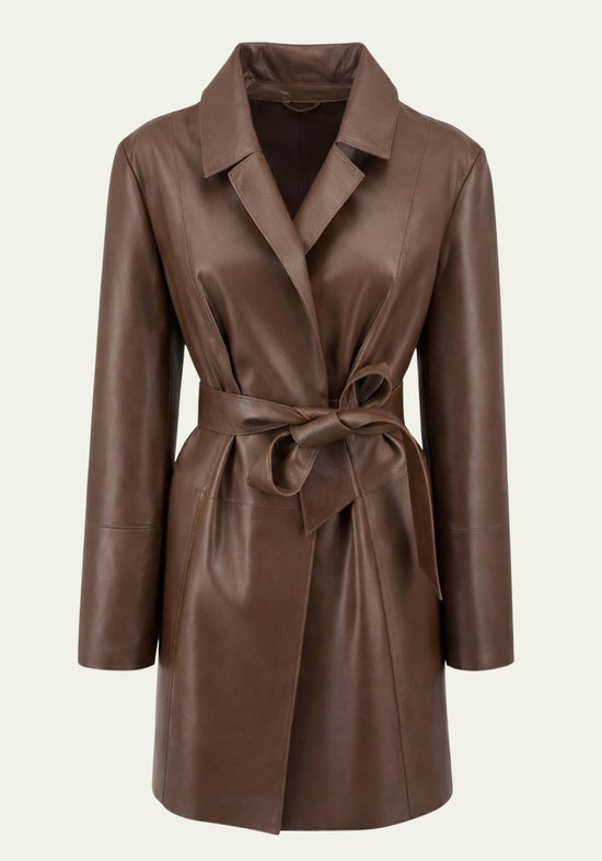 Brown women’s trench coat in lamb nappa leather, front view with tie belt and lapel collar.