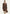 Brown women’s trench coat in lamb nappa leather, full-length view worn by a model with handbag.